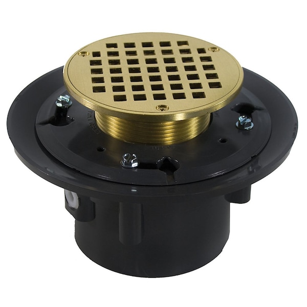 Jones Stephens 4in. Heavy Duty PVC Drain Base with 3-1/2in. Metal Spud and 5in. Polished Brass Strainer D49255 - main